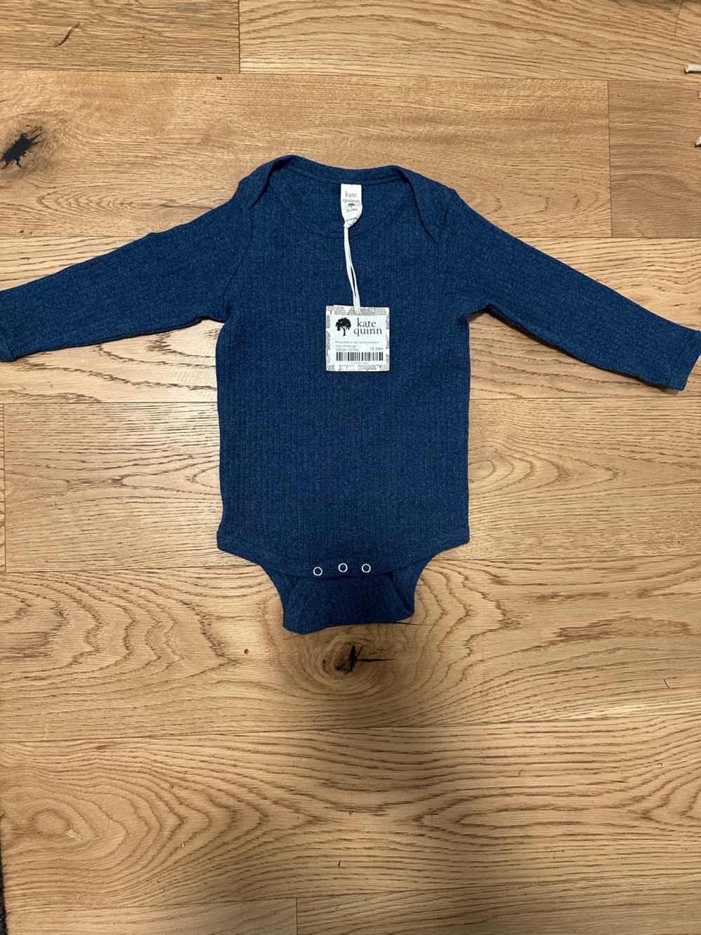 Kate Quinn Organic Cotton Onesie